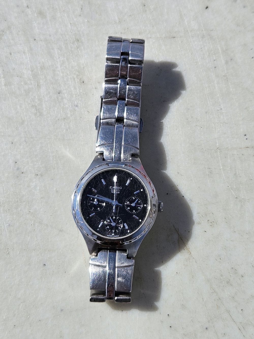 Casio Women's Silver Stainless Steel Watch with Black Dial